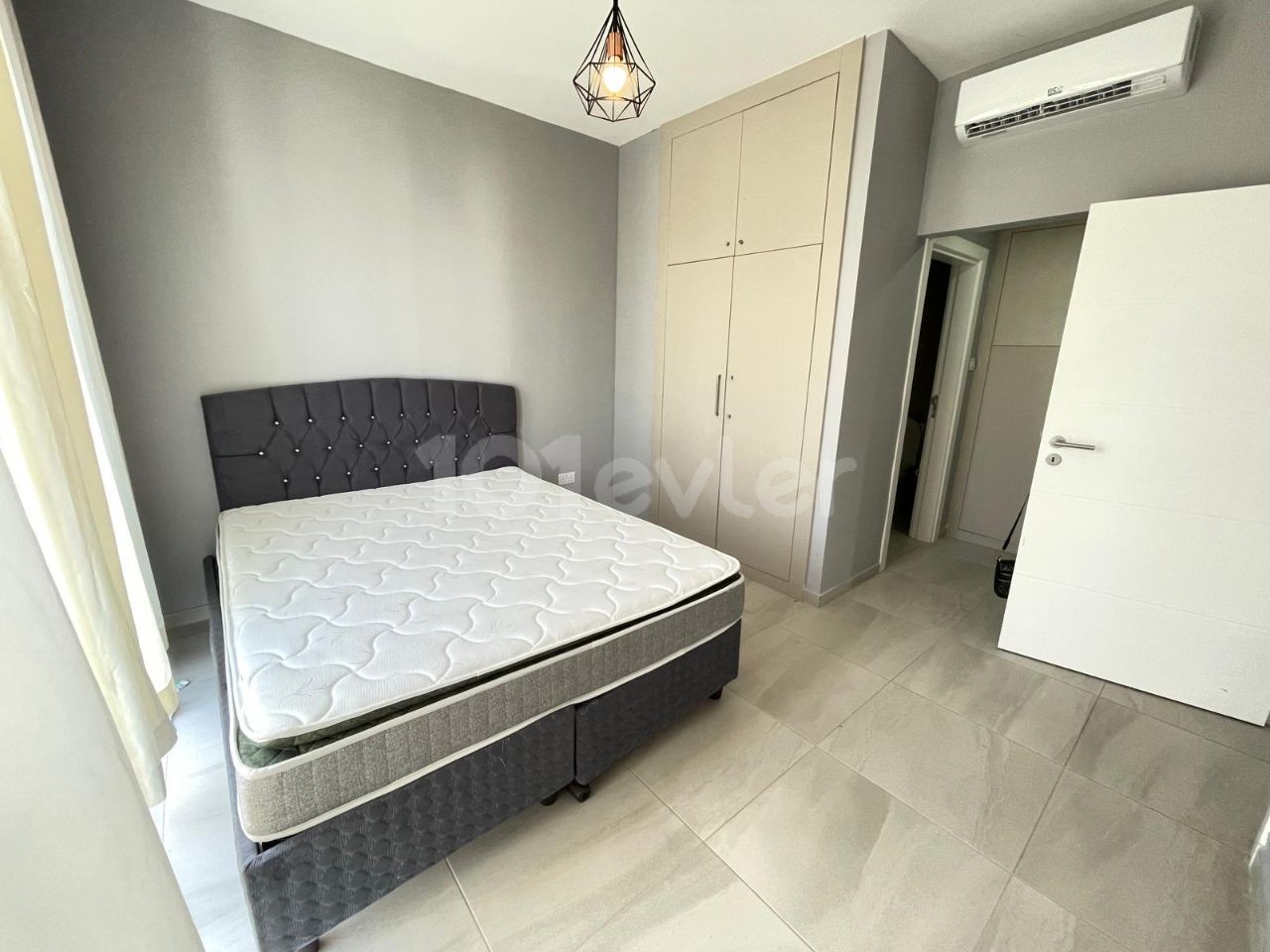 FULLY FURNISHED 2+1 APARTMENT FOR RENT WITH ITS OWN PRIVATE GARDEN IN A COMPLEX WITH POOL IN OLIVE GİRNE