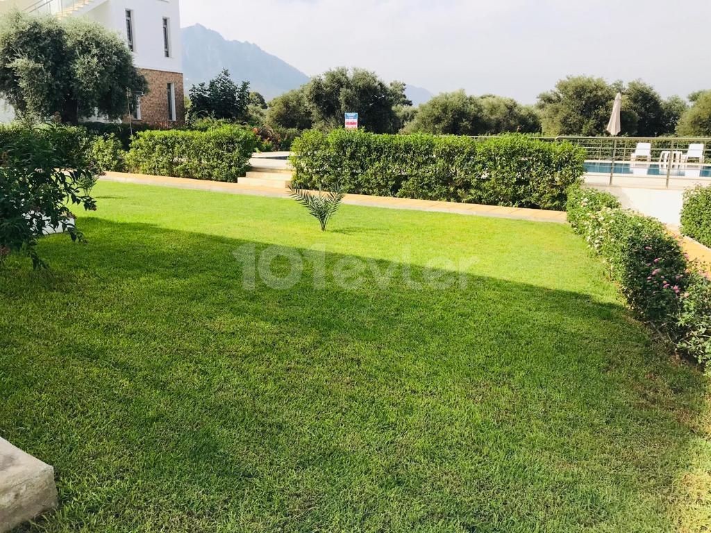 FULLY FURNISHED 2+1 APARTMENT FOR RENT WITH ITS OWN PRIVATE GARDEN IN A COMPLEX WITH POOL IN OLIVE GİRNE