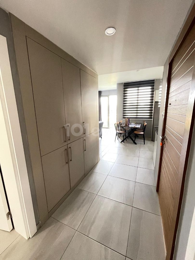 FULLY FURNISHED 2+1 APARTMENT WITH ITS OWN PRIVATE GARDEN IN OLIVE GİRNĖNLİK