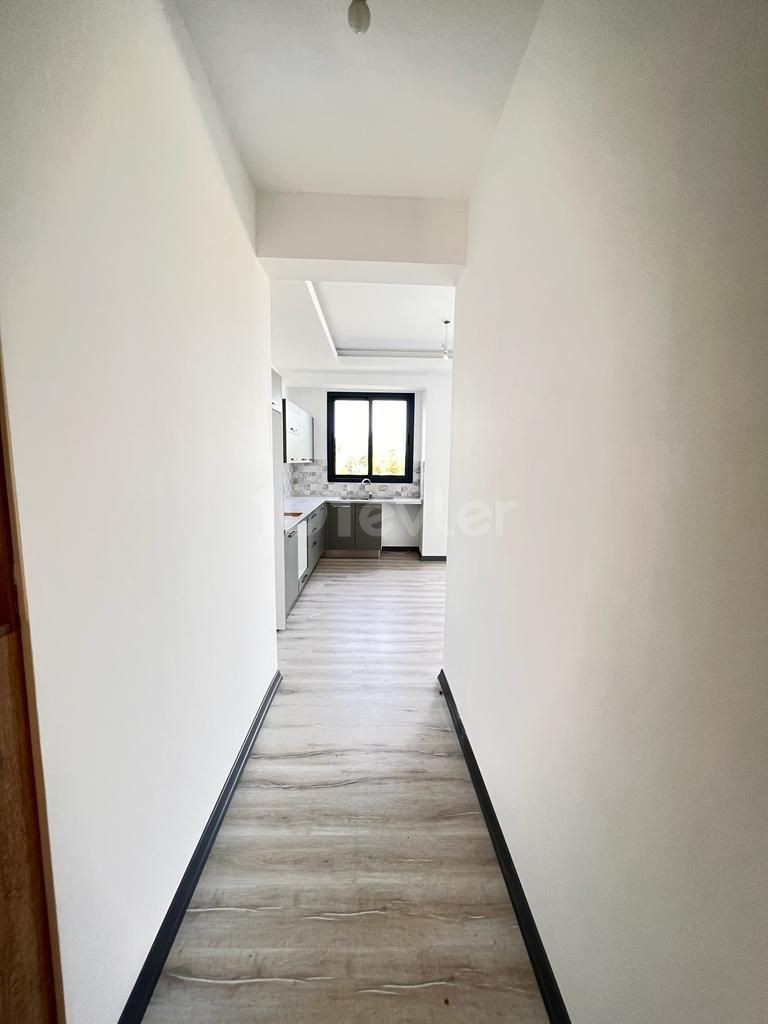 2+1 WOHNUNG ZU VERKAUFEN MIT GARTEN UND TERRASSENMÖGLICHKEITEN IN OZANKOY, ZYPERN GİRNE 