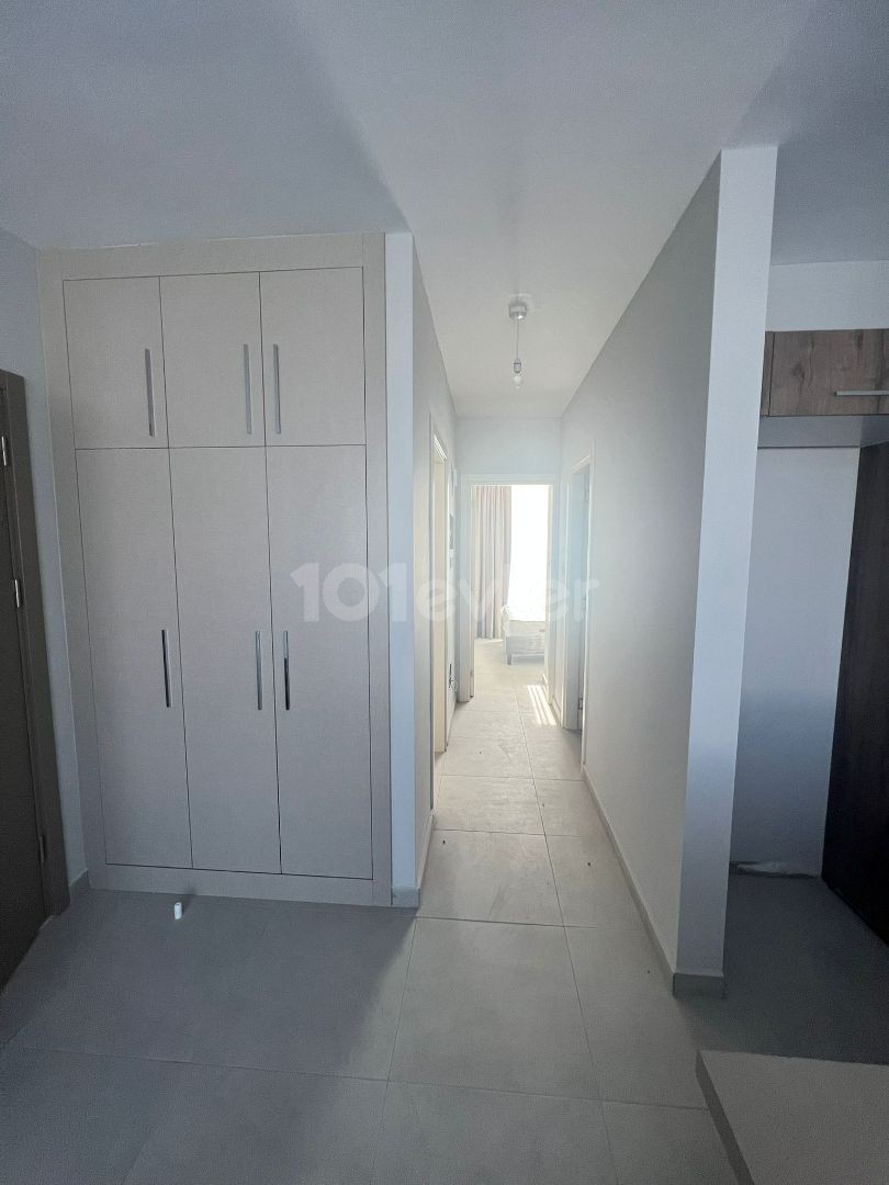 2+1 FLATS FOR SALE IN CYPRUS GIRNE ALSANCAK REGION WITH CLOSED PARKING PARKING, TERRACE, MOUNTAIN, SEA VIEW, TURN KEY AFTER 50% PAYMENT, 12 MONTHS MAINTENANCE.