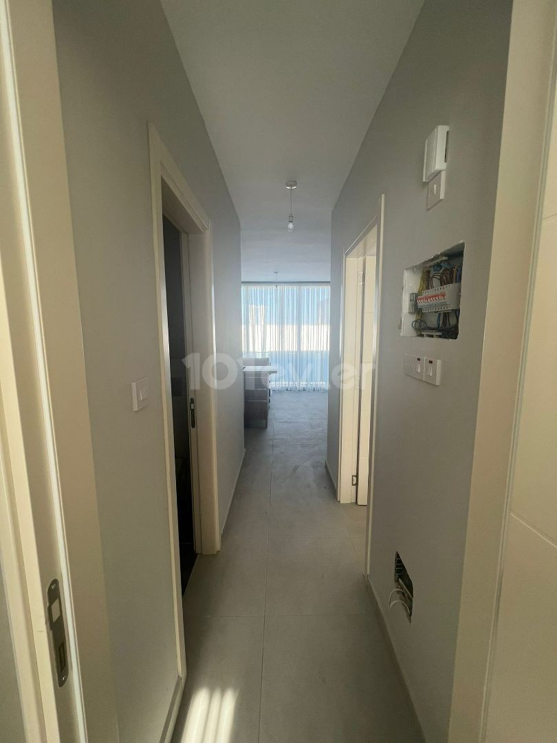 2+1 FLATS FOR SALE IN CYPRUS GIRNE ALSANCAK REGION WITH CLOSED PARKING PARKING, TERRACE, MOUNTAIN, SEA VIEW, TURN KEY AFTER 50% PAYMENT, 12 MONTHS MAINTENANCE.