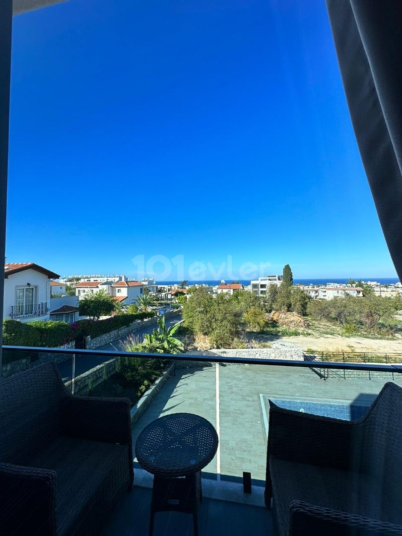 3+1 FLATS FOR SALE IN CYPRUS GIRNE ALSANCAK AREA, WITHIN A SITE WITH A POOL, WITH TERRACE OR GARDEN FLOOR OPTIONS, WITH MOUNTAIN AND SEA VIEWS, OFFERING A TURN KEY 12 MONTHS PAYMENT AFTER 50% PAYMENT.