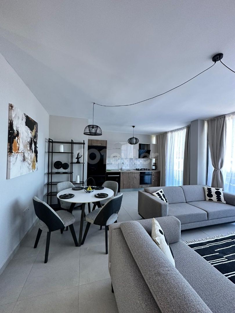 3+1 FLATS FOR SALE IN CYPRUS GIRNE ALSANCAK AREA, WITHIN A SITE WITH A POOL, WITH TERRACE OR GARDEN FLOOR OPTIONS, WITH MOUNTAIN AND SEA VIEWS, OFFERING A TURN KEY 12 MONTHS PAYMENT AFTER 50% PAYMENT.