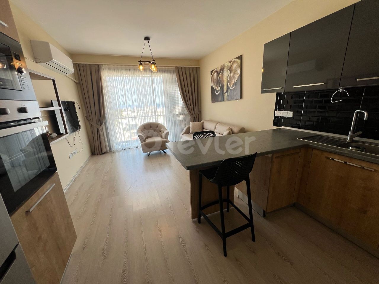 FULLY FURNISHED 2+1 FLAT FOR RENT IN KYRENIA CENTER WITH MOUNTAIN AND SEA VIEWS