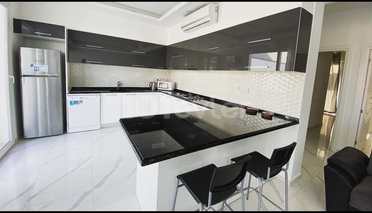 2 + 1 PENTHOUSE FULLY FURNISHED LUXURY RENTAL APARTMENT IN DEREBOYU WITH AN ANNUAL DEPOSIT OF 550 POUNDS STERLING ** 