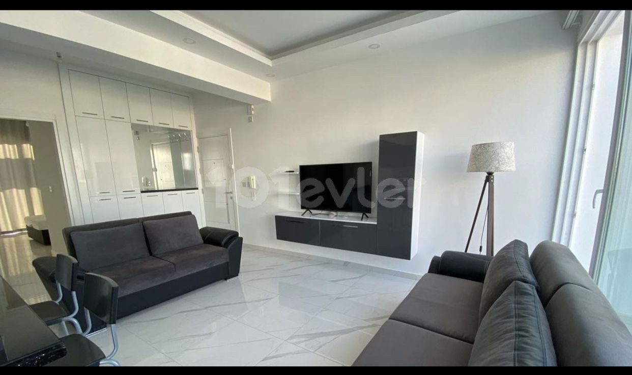 2 + 1 PENTHOUSE FULLY FURNISHED LUXURY RENTAL APARTMENT IN DEREBOYU WITH AN ANNUAL DEPOSIT OF 550 POUNDS STERLING ** 