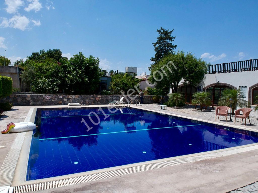 1 + 1 APARTMENT FOR SALE IN KYRENIA OZANKOY REGION OF TRNC ON A SITE WITH A POOL ** 