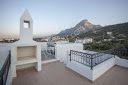 Stunning  3 bedroom villa with communal swimming pool and private garden, sea and mountain views 