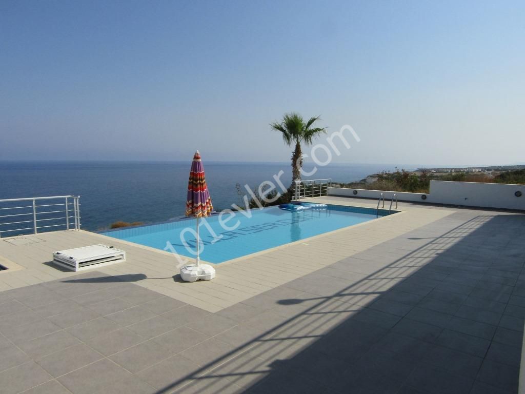 'Executive 3 bedroom Private VILLA, Perfect cliff top location situated directly above the shoreline giving amazing SEA VIEWs and sunsets. Very secluded, Private 10m x 5m infinity pool with separate 2m x 2m paddling pool. Large terraces, shade, Poolside WC and shower facilities. Stone BBQ, Off road 