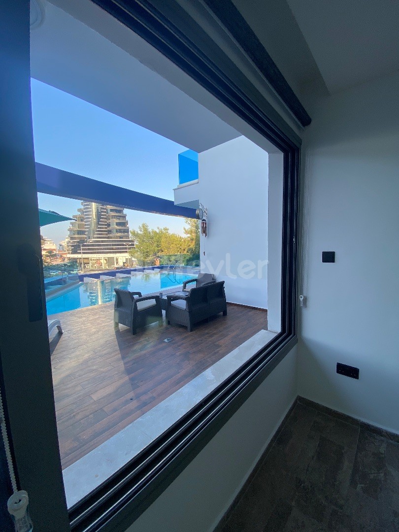 2+1 IN THE CITY CENTER WITH SHARED POOL