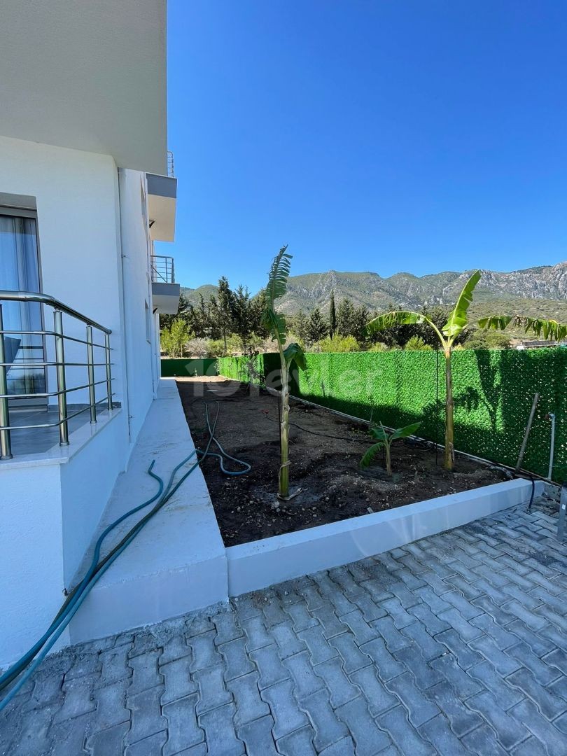 KYRENIA AMERICAN COLLEGE 2 + 1 APARTMENT WITH LARGE GARDEN FOR RENT BEHIND ** 