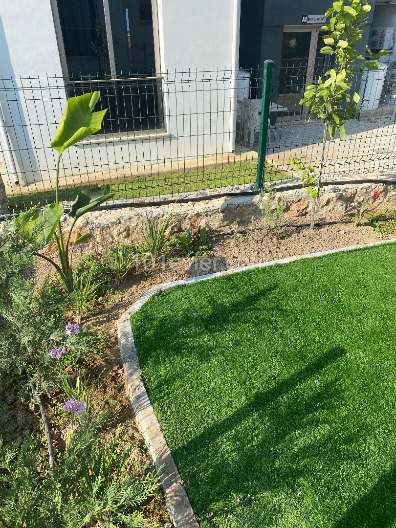 BY THE OWNER, 2+1 SPACIOUS GARDEN FLOOR FOR SALE IN ÇATALKÖY, WITH RENTAL OF 700 GBP ** 