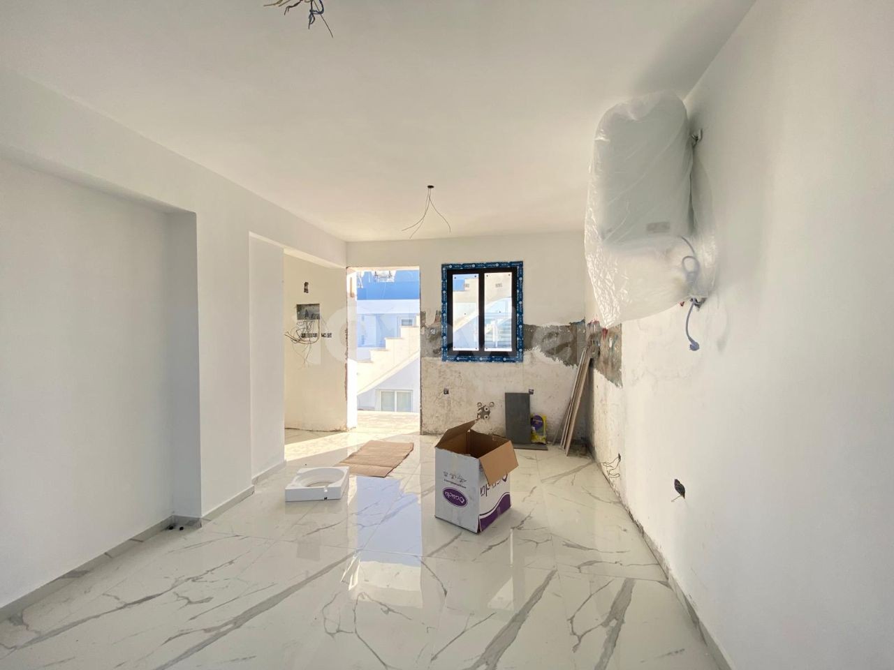 Недавно построенная квартира 1+1 с балконом в Караогланоглу, Кирения