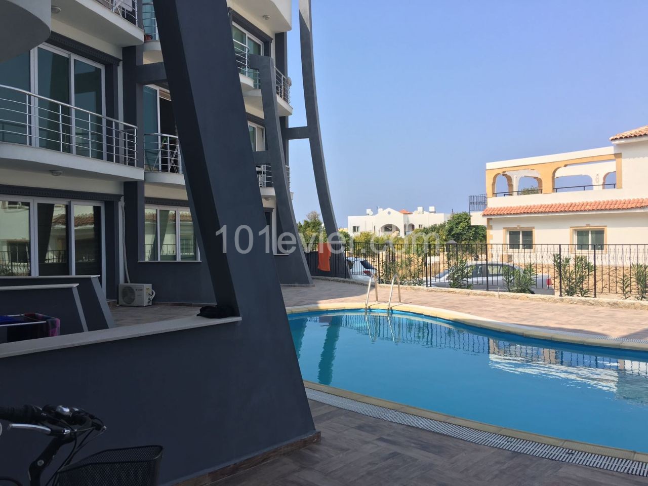 For sale Kyrenia-Alsancak 1+1, fully furnished, air-conditioned, has a terrace, half park, 42 square meters, first floor, in a complex with pool, 8 years building, equivalent to your husband.