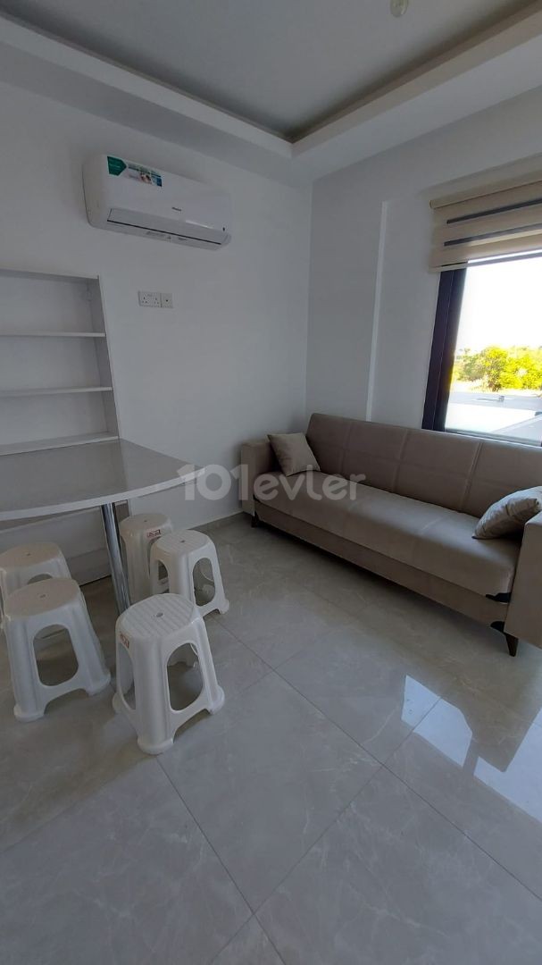 Girne - Alsancak kiralik daire 1+1 esyali, site icinde, havuzlu