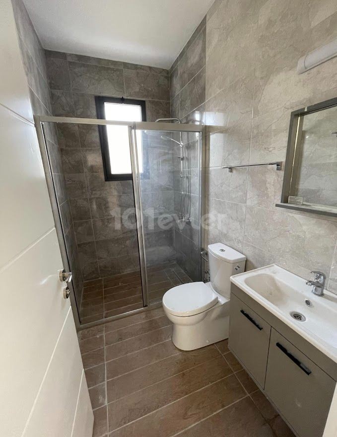 Girne - Alsancak, satılık yeni daire 2+1, Camelot Plajı'nın yanında