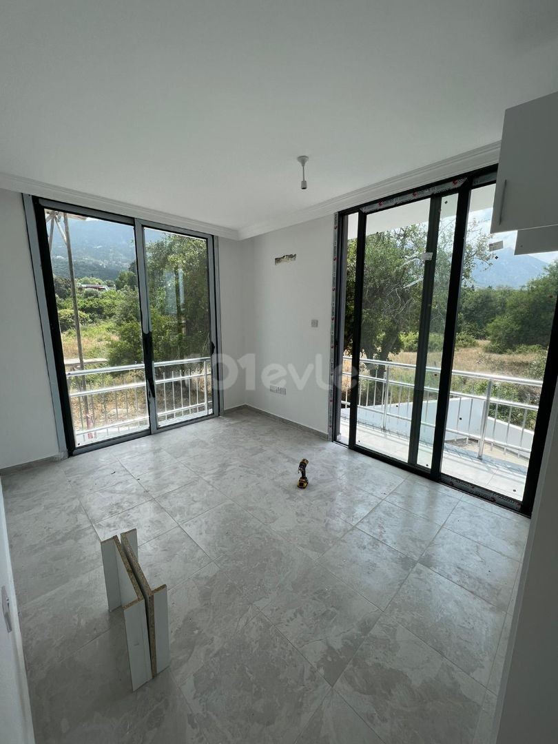 2+1 Flat in the Center of Lapta with Swimming Pool and Ground Parking