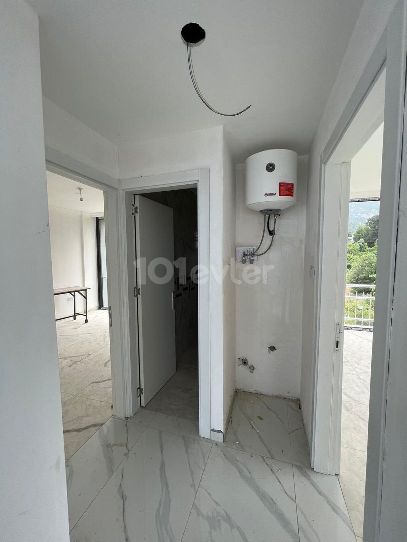 2+1 Flat in the Center of Lapta with Swimming Pool and Ground Parking