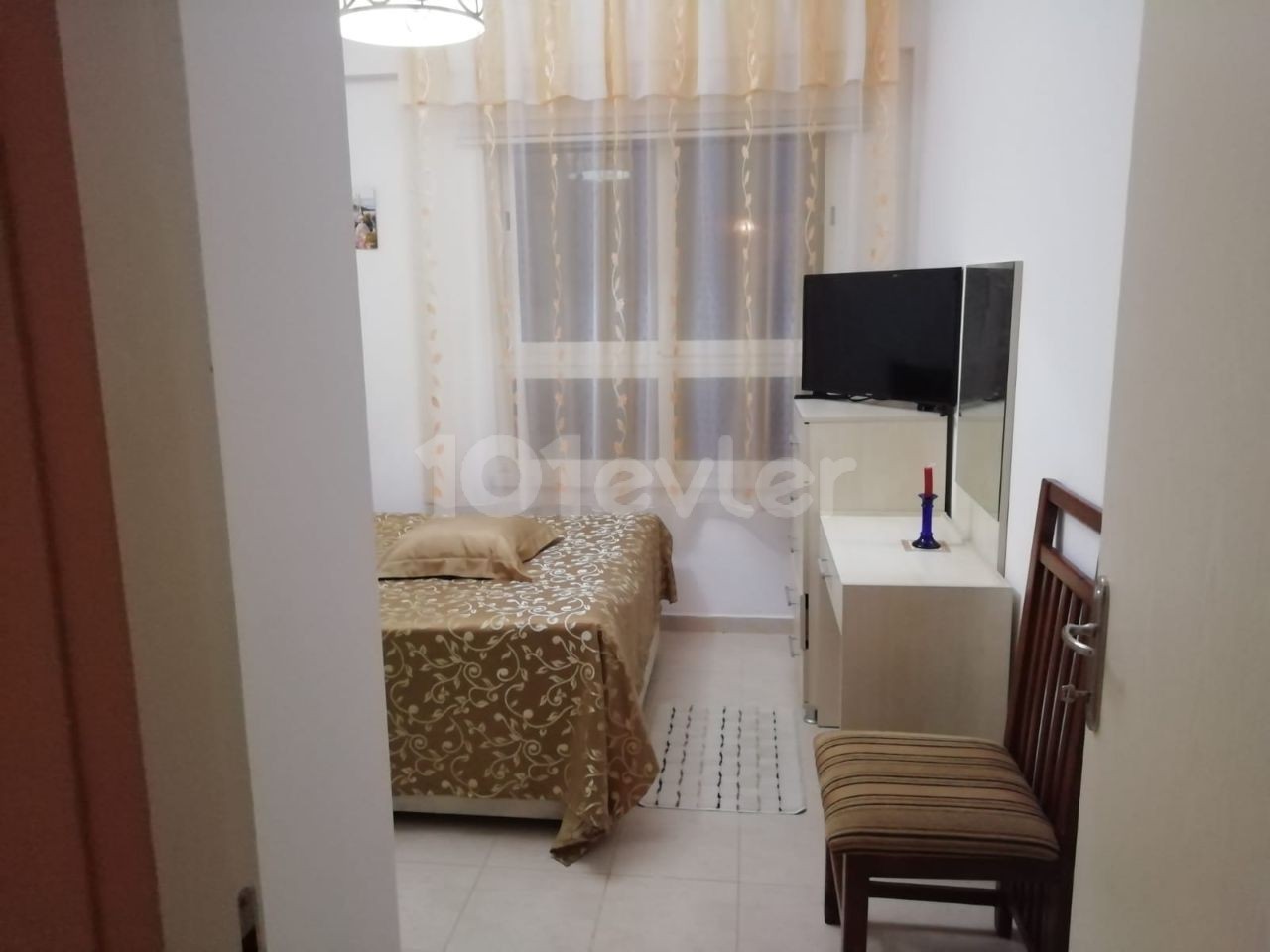 Kyrenia - Esentepe, furnished, 2+1 flat with white goods and private garden. It is 300 meters from the sea. We can speak Turkish, English and Russian.