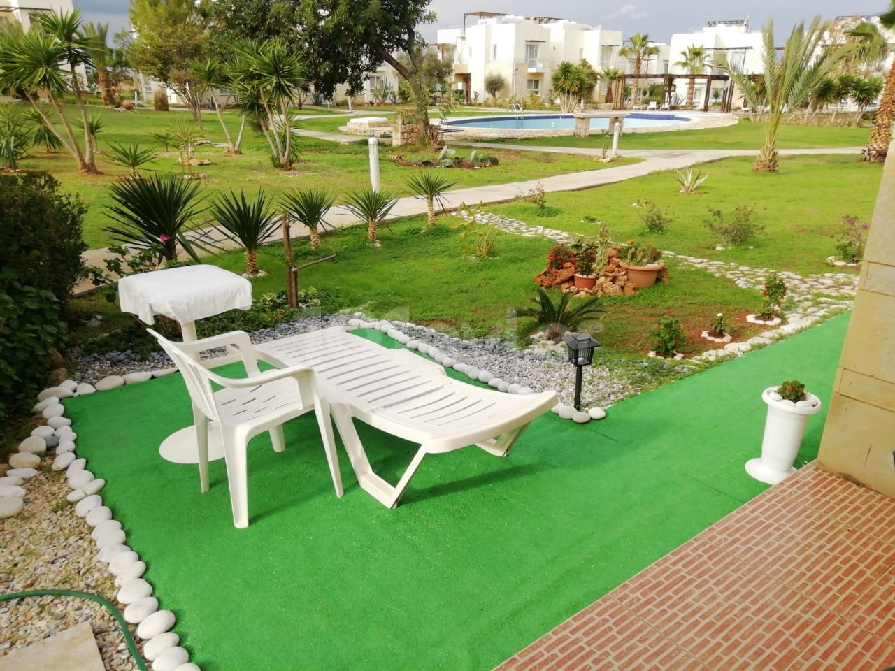 Kyrenia - Esentepe, furnished, 2+1 flat with white goods and private garden. It is 300 meters from the sea. We can speak Turkish, English and Russian.