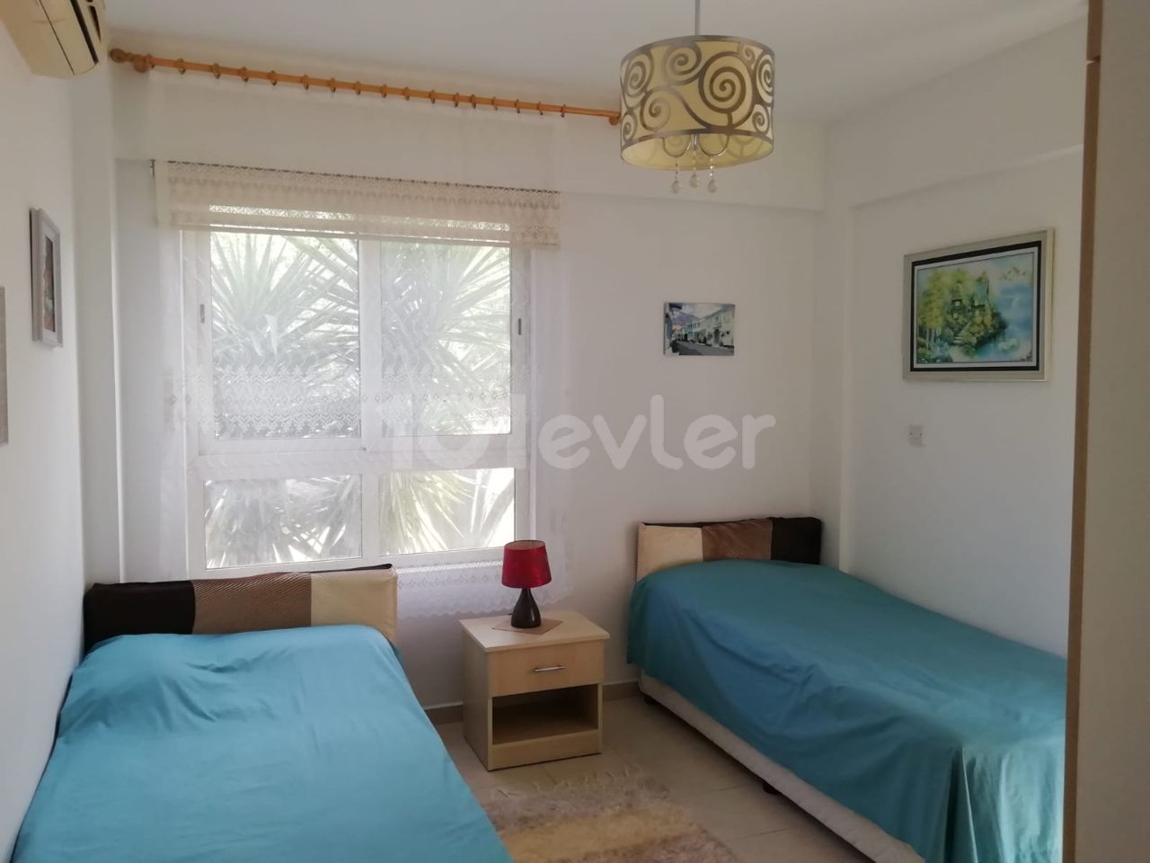 Kyrenia - Esentepe, furnished, 2+1 flat with white goods and private garden. It is 300 meters from the sea. We can speak Turkish, English and Russian.