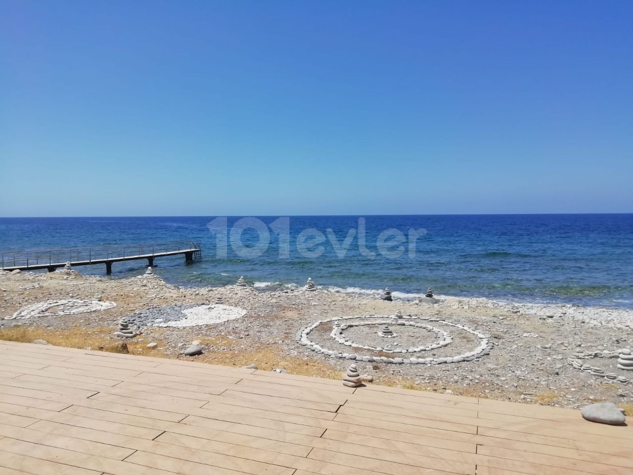 Kyrenia - Esentepe, furnished, 2+1 flat with white goods and private garden. It is 300 meters from the sea. We can speak Turkish, English and Russian.