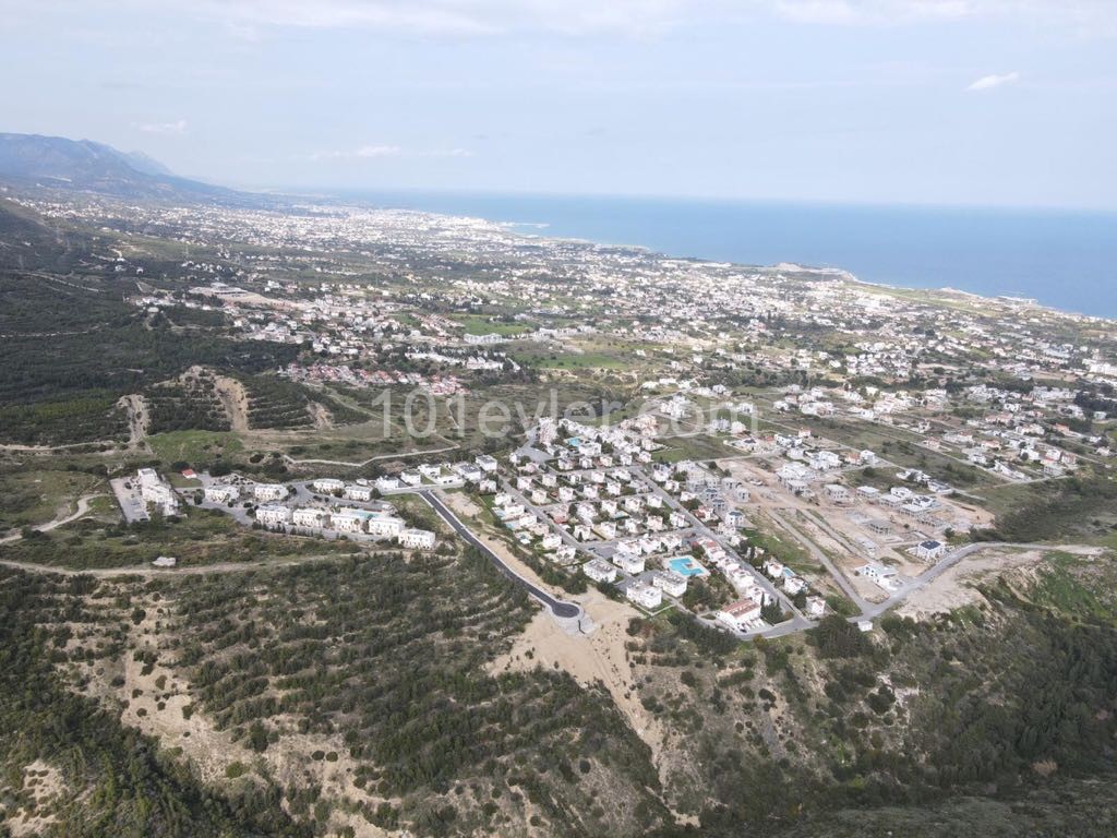 For sale, a dec80m2 Plot equivalent to 100%, with a large sea view, in one of the fast-developing areas at Çatalkoy ** 