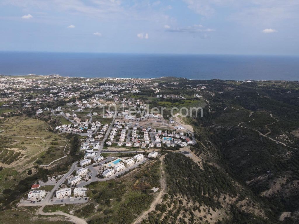 For sale, a dec80m2 Plot equivalent to 100%, with a large sea view, in one of the fast-developing areas at Çatalkoy ** 