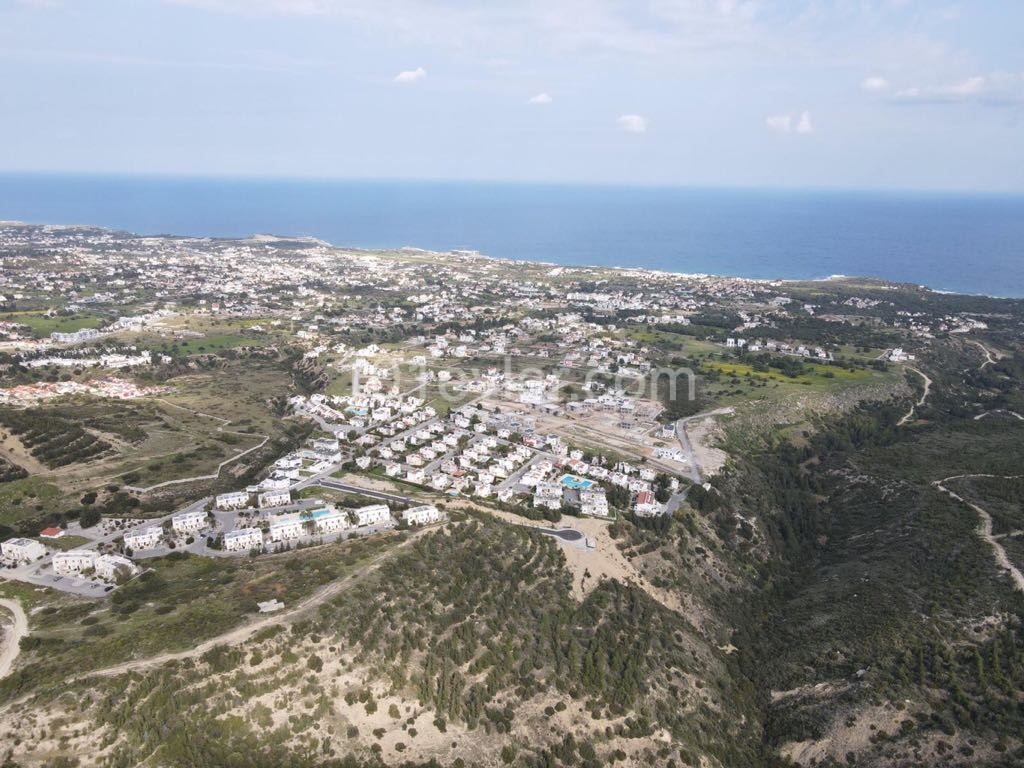 For sale, a dec80m2 Plot equivalent to 100%, with a large sea view, in one of the fast-developing areas at Çatalkoy ** 