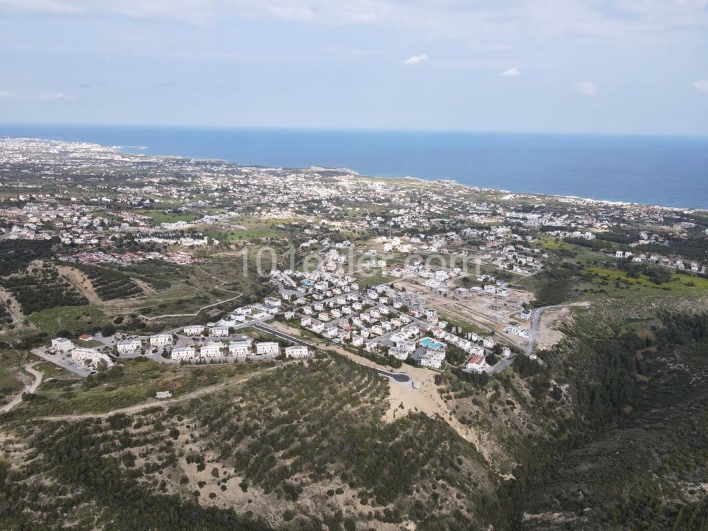 For sale, a dec80m2 Plot equivalent to 100%, with a large sea view, in one of the fast-developing areas at Çatalkoy ** 