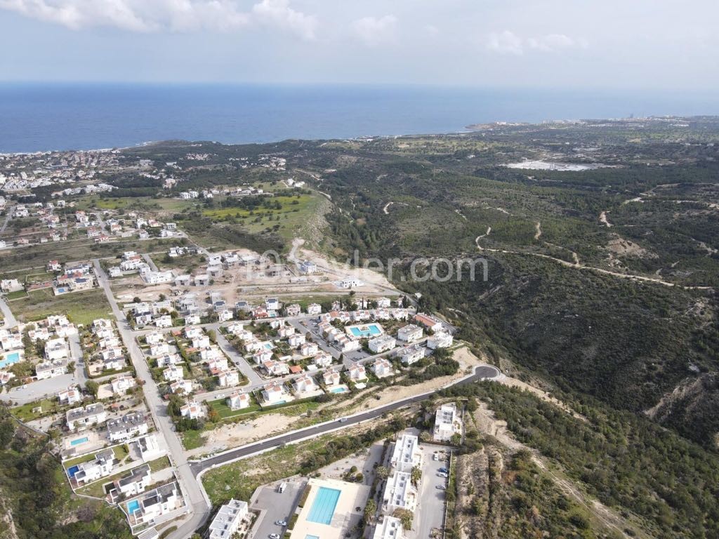 For sale, a dec80m2 Plot equivalent to 100%, with a large sea view, in one of the fast-developing areas at Çatalkoy ** 