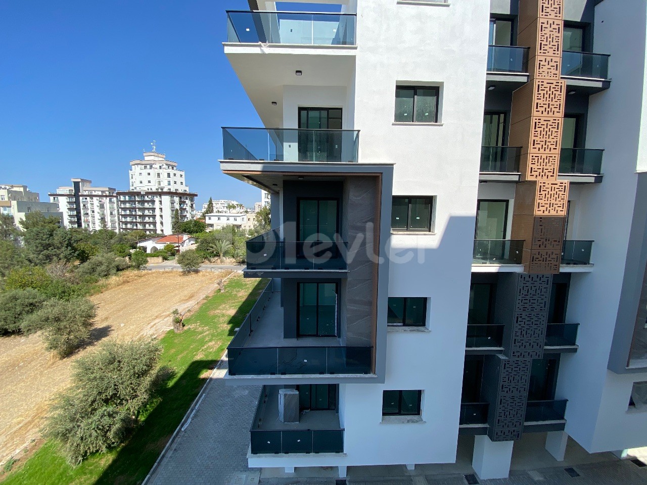 A 1-Bedroom Apartment with a Newly Finished Office Permit, Mountain and Sea Views, Located on a Site with a Pool in the Center of Kyrenia ** 