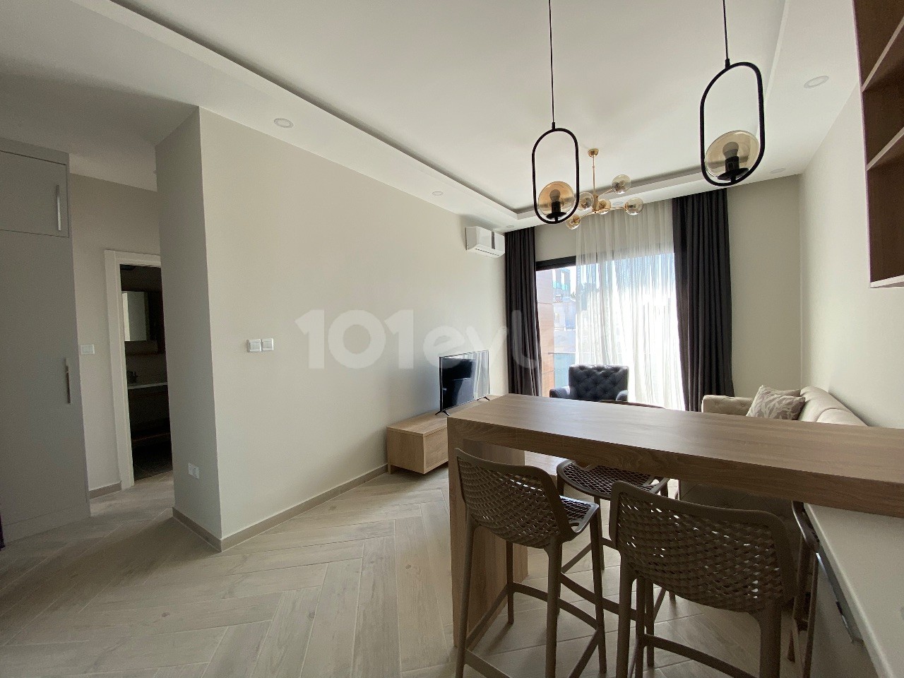 A 1-Bedroom Apartment with a Newly Finished Office Permit, Mountain and Sea Views, Located on a Site with a Pool in the Center of Kyrenia ** 