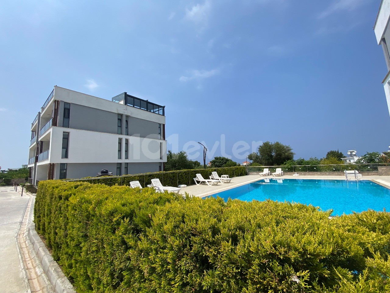 A Spacious 2-Bedroom Comfortable and Newly Finished Decked Apartment with Mountain and Sea Views, Located in a Well-Maintained Site with a Pool in Kyrenia Lapta ** 