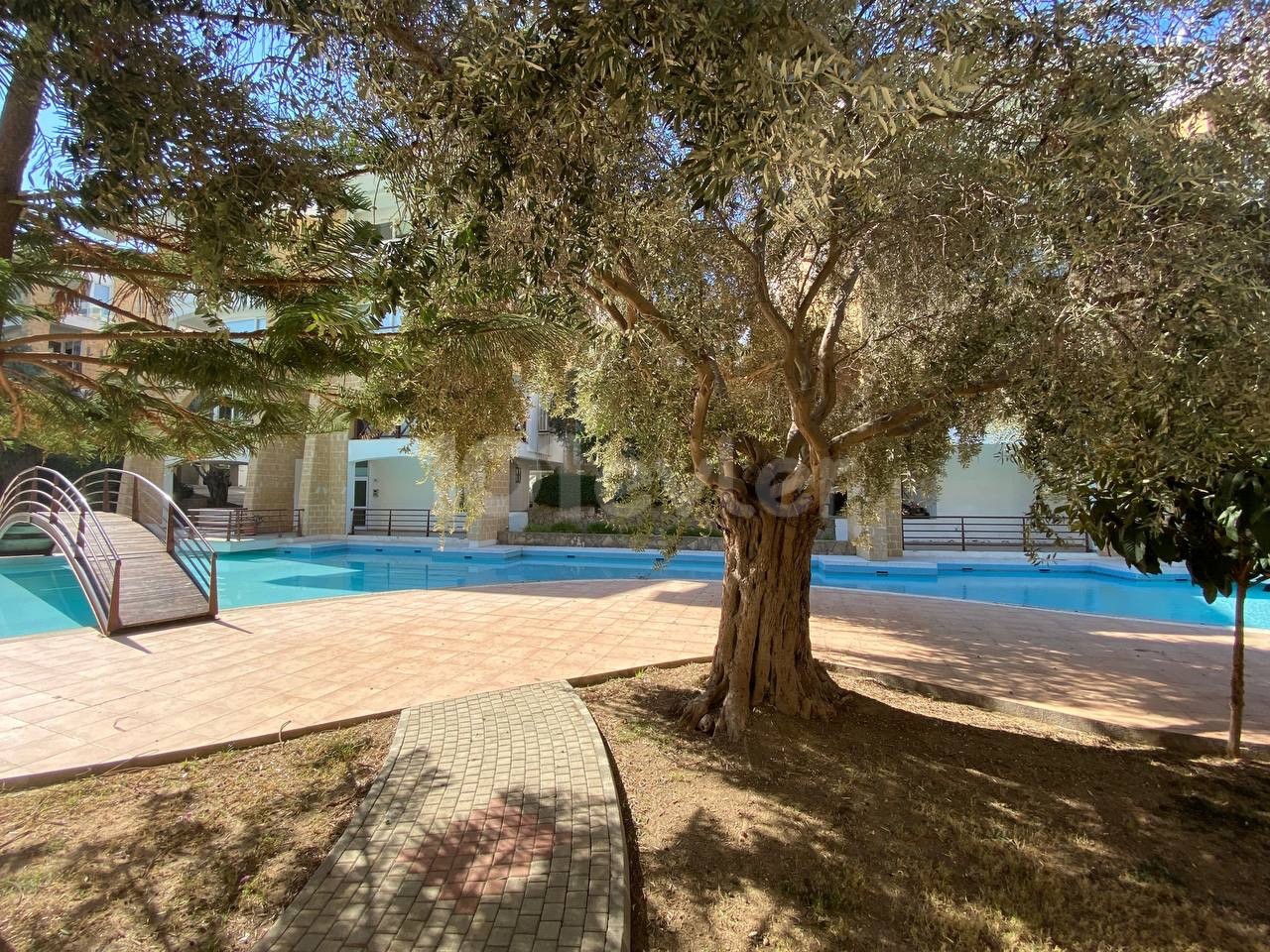 The 3-Bedroom Piabella Hotel in the Center of Kyrenia is walking distance to the new Shopping Center behind the den!, Our Apartment with 3 large shared Pools ** 