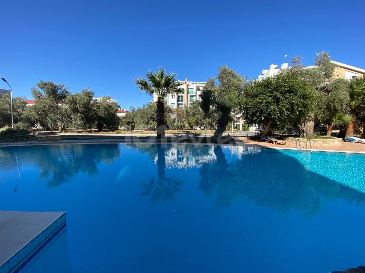 The 3-Bedroom Piabella Hotel in the Center of Kyrenia is walking distance to the new Shopping Center behind the den!, Our Apartment with 3 large shared Pools ** 