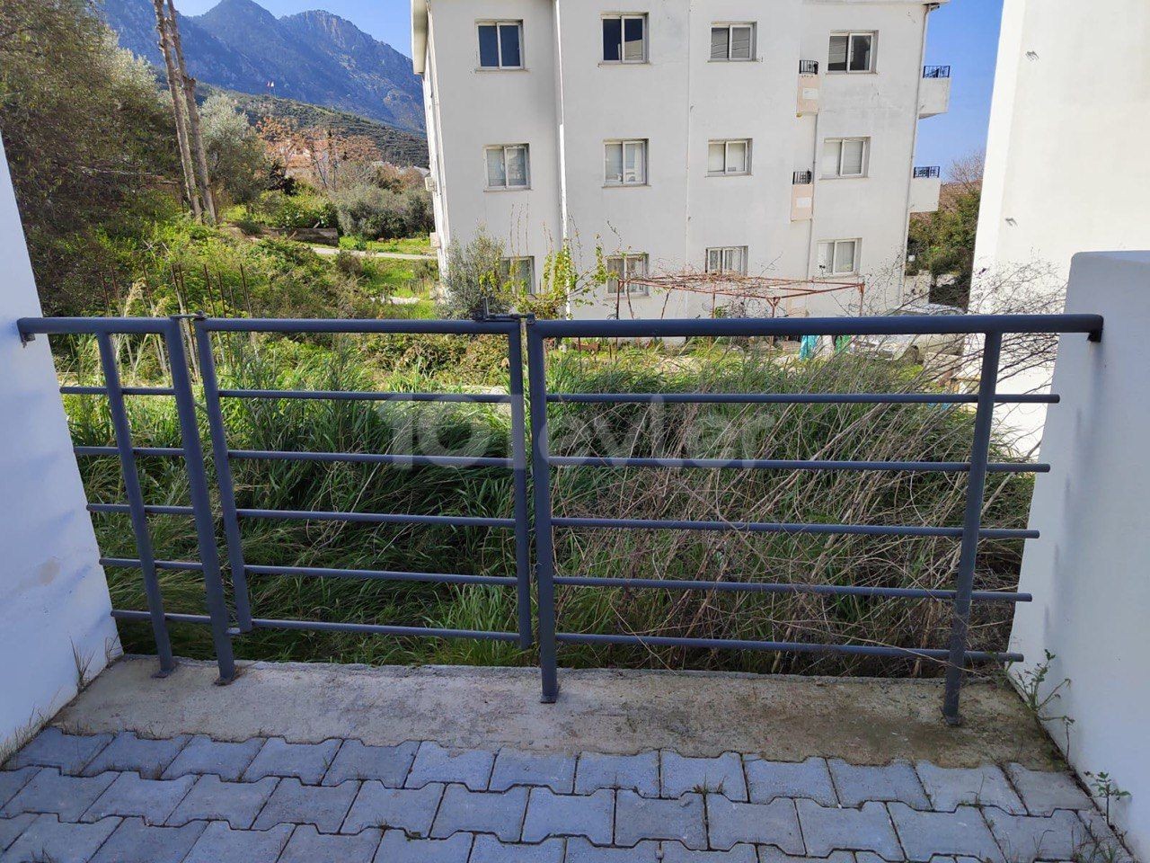 Our 2 Bedroom Corner Apartment with Garden, Ground Floor and Sea View in Lapta, Kyrenia, which is within walking distance to the newly built beach.