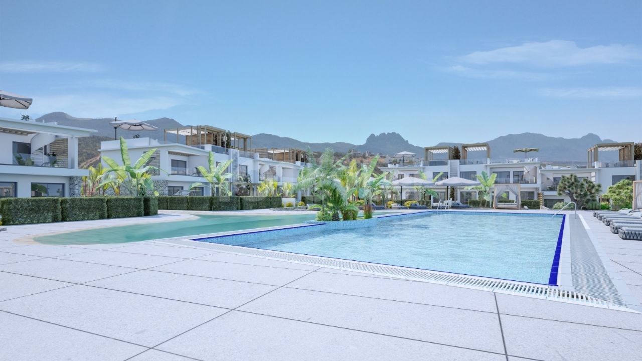 Kyrenia Esentepe 2 & 3 Schlafzimmer Central Sunbed Shared Pool mit Sonnenliegen Back Mountain Front Open to the Sea Unser neues Projekt