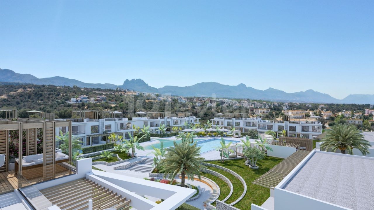 Kyrenia Esentepe 2 & 3 Schlafzimmer Central Sunbed Shared Pool mit Sonnenliegen Back Mountain Front Open to the Sea Unser neues Projekt