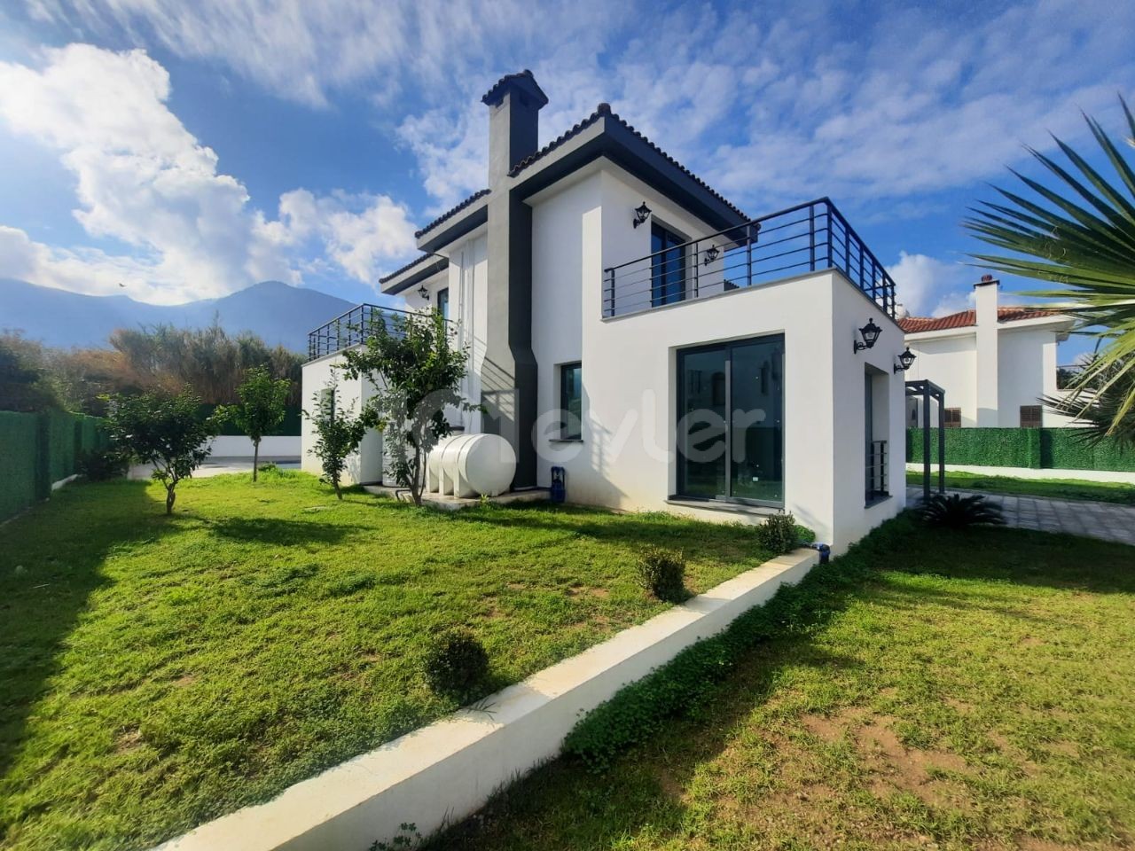 LUXURY villa for sale in Bellapais with 4 bedrooms and private pool with sea view, close to the ESK