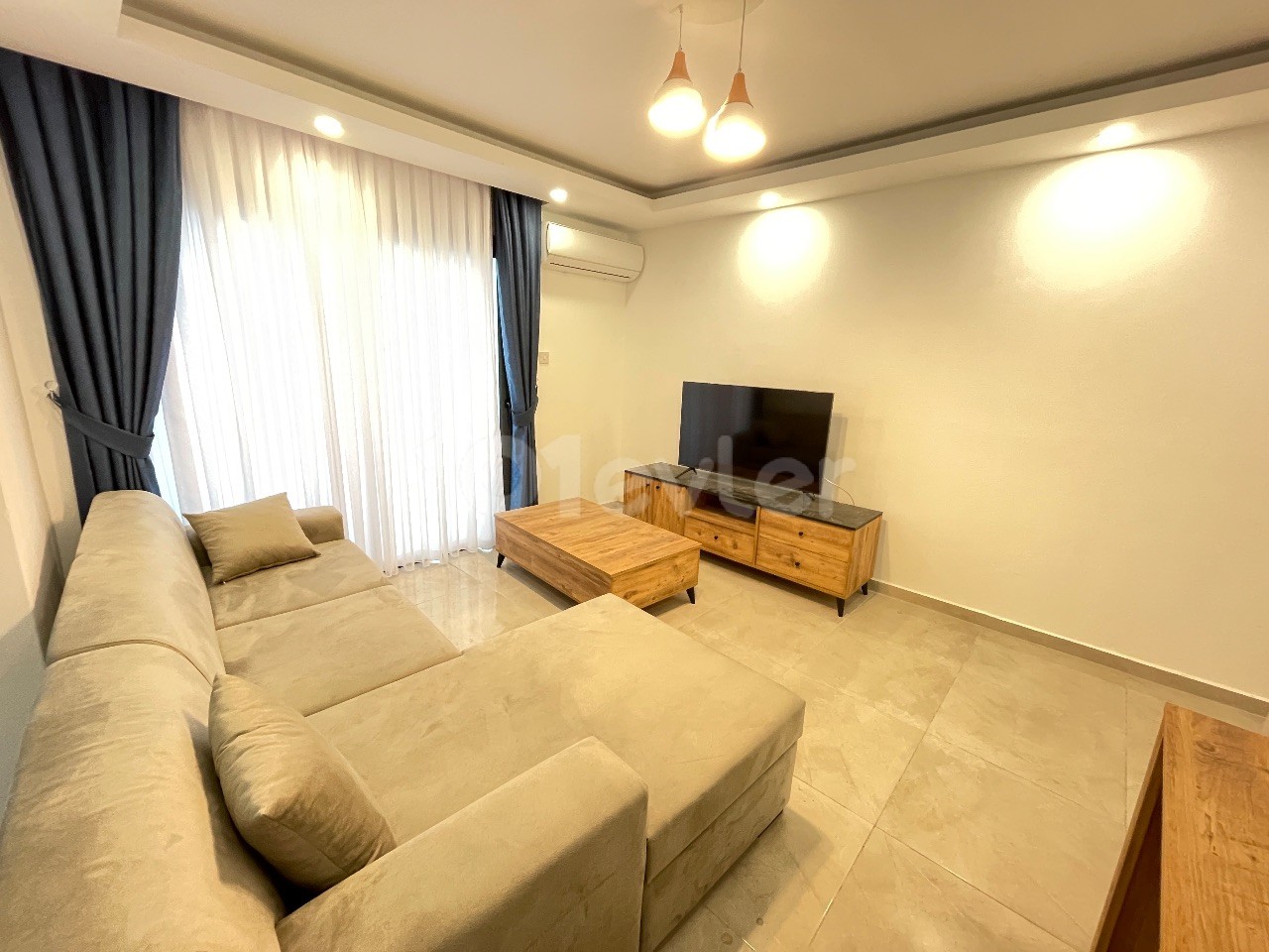 KIBRIS GİRNE ALSANCAK BÖLGESİNDE ORTAK HAVUZLU SİTEDE 2+1 SATILIK DAİRE