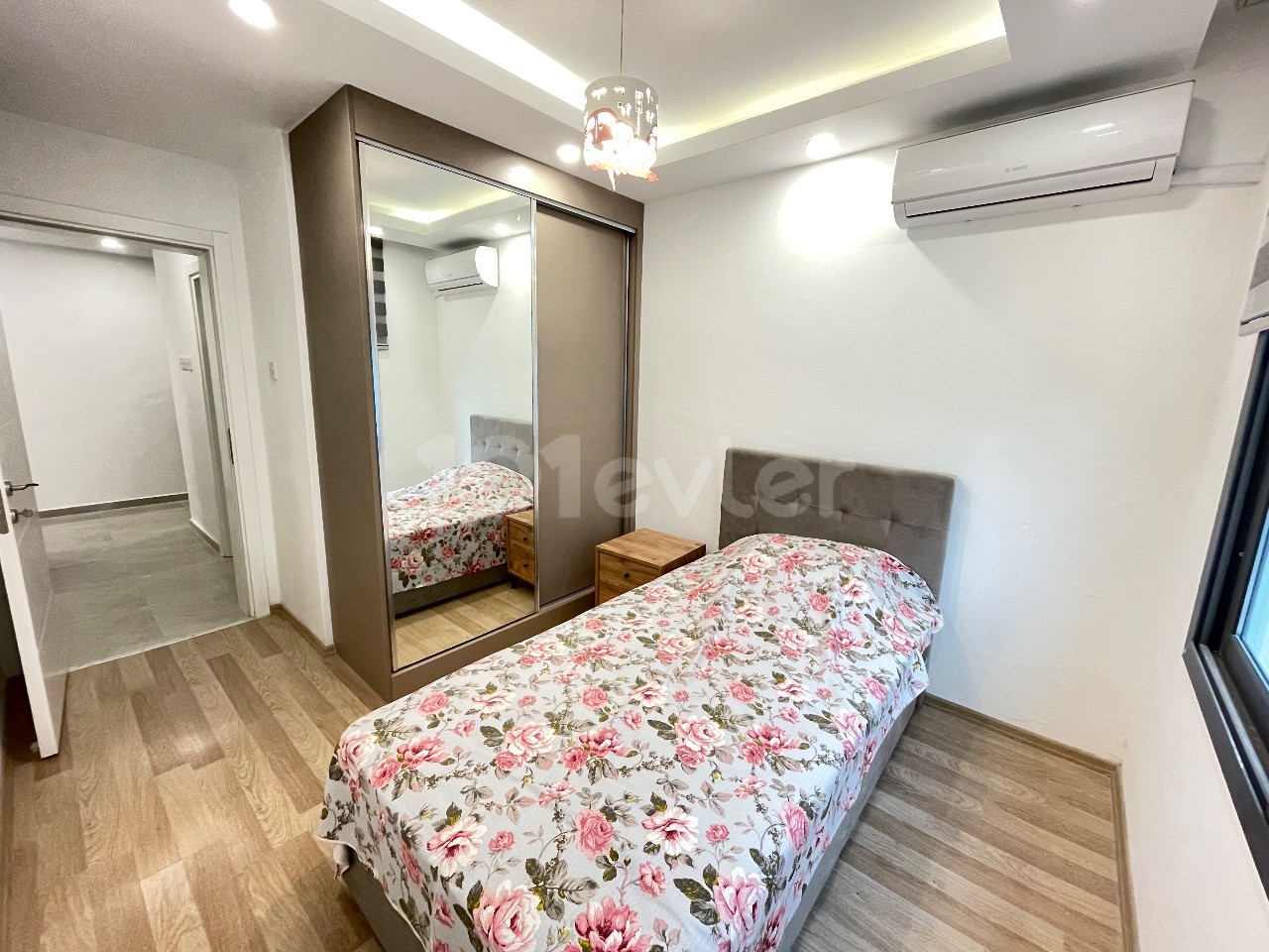 KIBRIS GİRNE ALSANCAK BÖLGESİNDE ORTAK HAVUZLU SİTEDE 2+1 SATILIK DAİRE