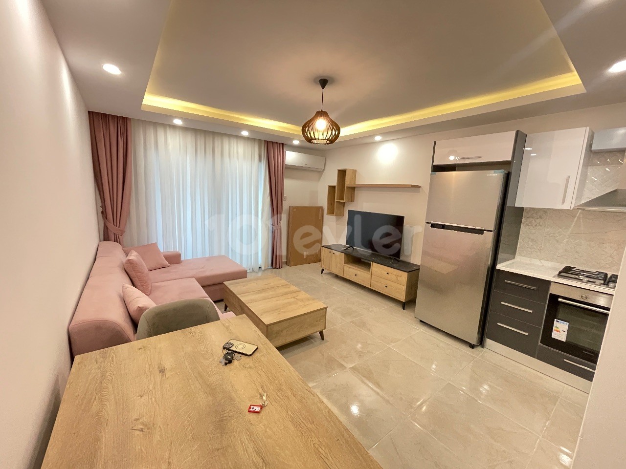 KIBRIS GİRNE ALSANCAK BÖLGESİNDE ORTAK HAVUZLU SİTEDE 1+1 SATILIK DAİRE