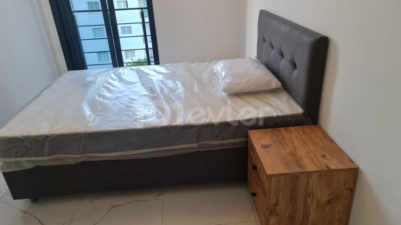 Alsancakta  eşyalı kiralık 1+1 yeni  daire