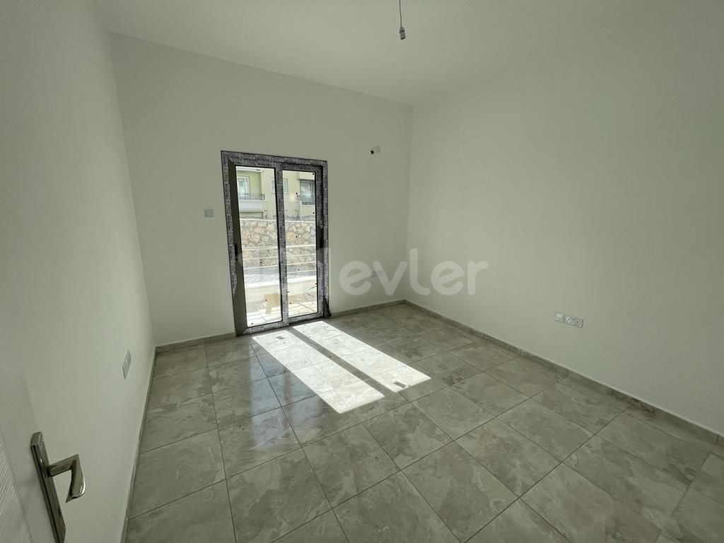 2+1 flat for sale in the site with swimming pool in Alsancak 