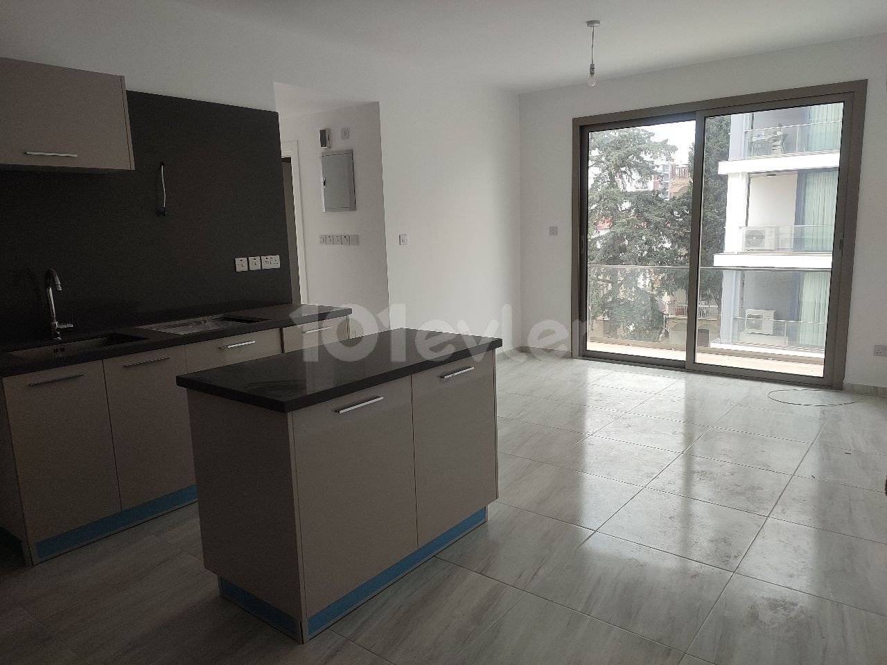 2+1 flat for sale in the center off Kyreniye with a commercial permit