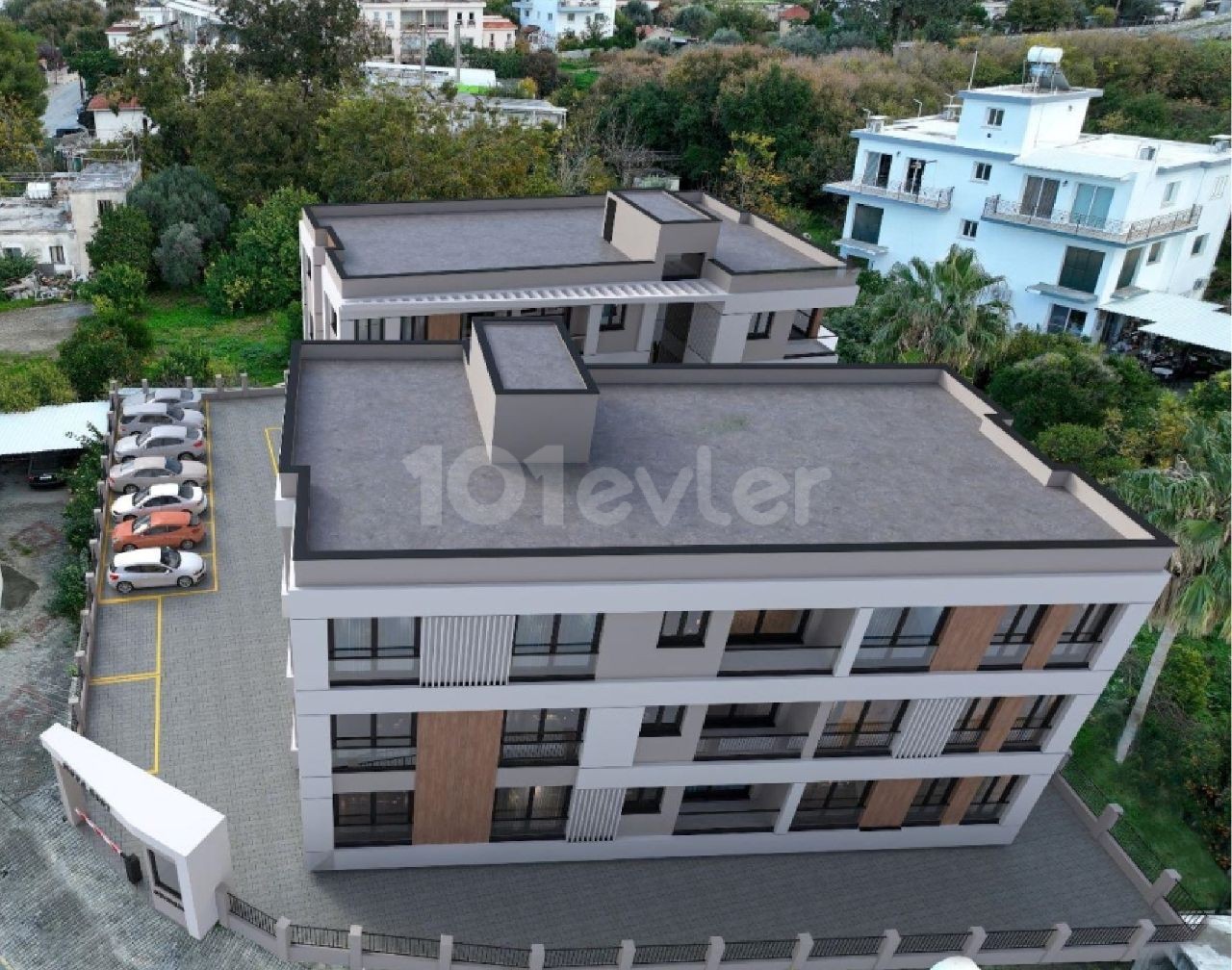 Girne Lapta'da yüzme havuzlu site içerisinde  satılık 2+1 ve 3+1 daireler