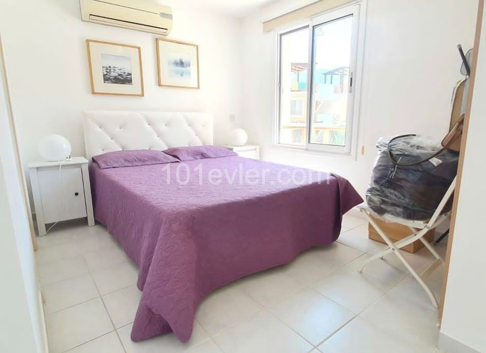 1+1 ground floor duplex apartment with garden in a well-maintained site 500m from the sea in Kyrenia Alsancak. Fully Furnished (can be converted to 2+1). 05338403555 ** 