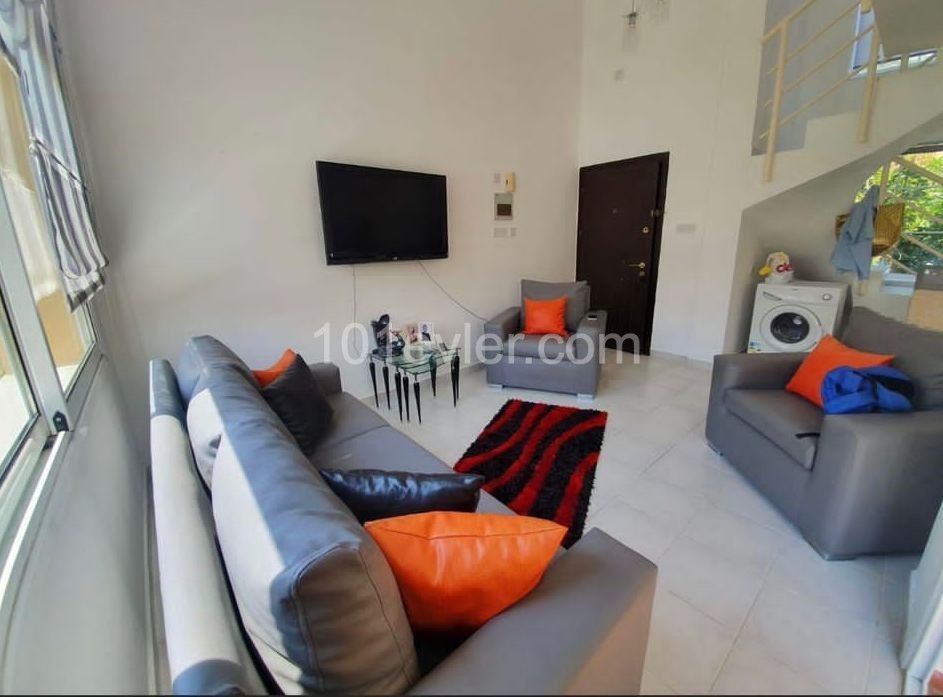 1+1 ground floor duplex apartment with garden in a well-maintained site 500m from the sea in Kyrenia Alsancak. Fully Furnished (can be converted to 2+1). 05338403555 ** 